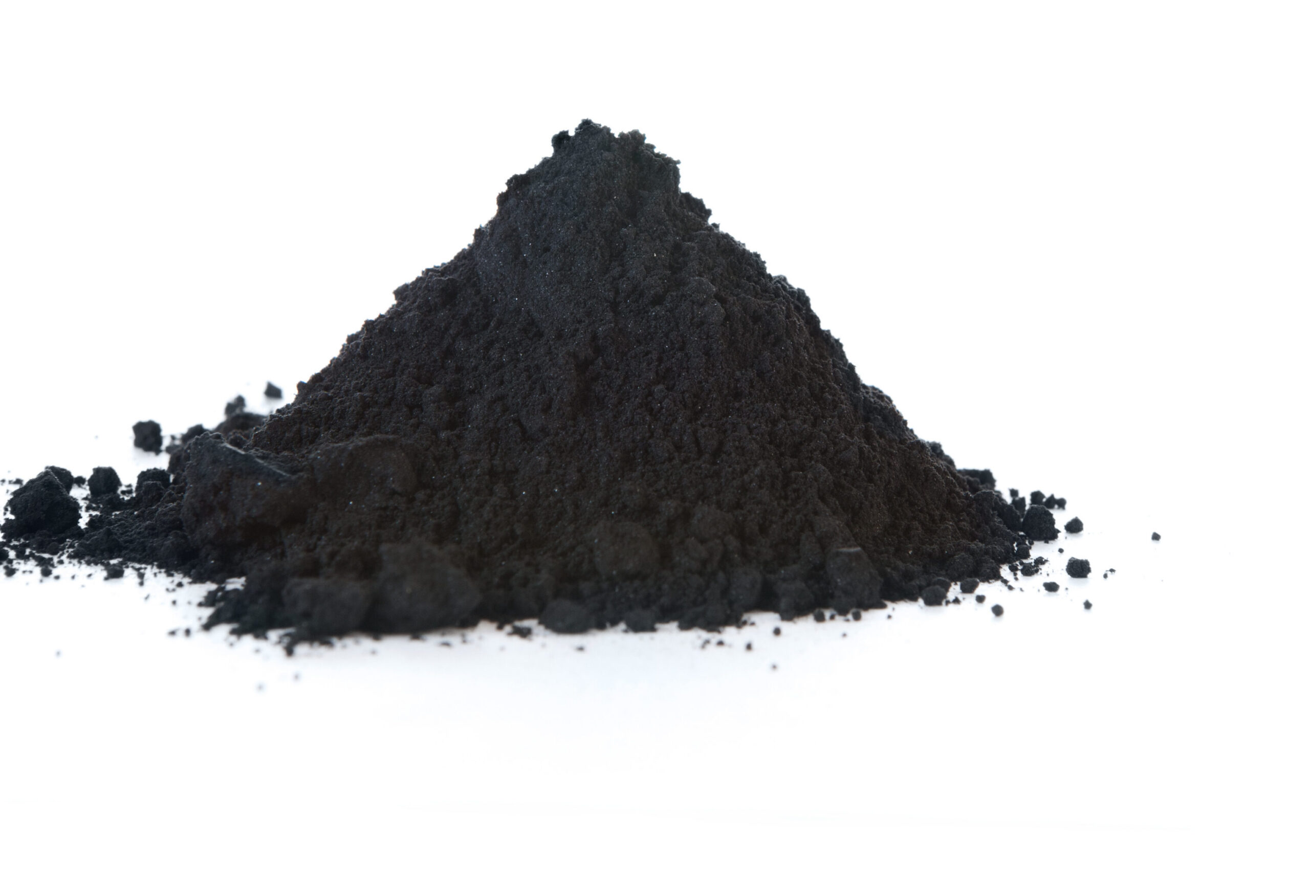 Black powder pile on a white background, showcasing fine texture and rich color, commonly used in art, cosmetics, and industrial applications.