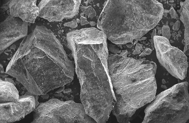 Close-up view of various mineral rocks displaying rough textures and angular shapes, suitable for geological studies and educational purposes.