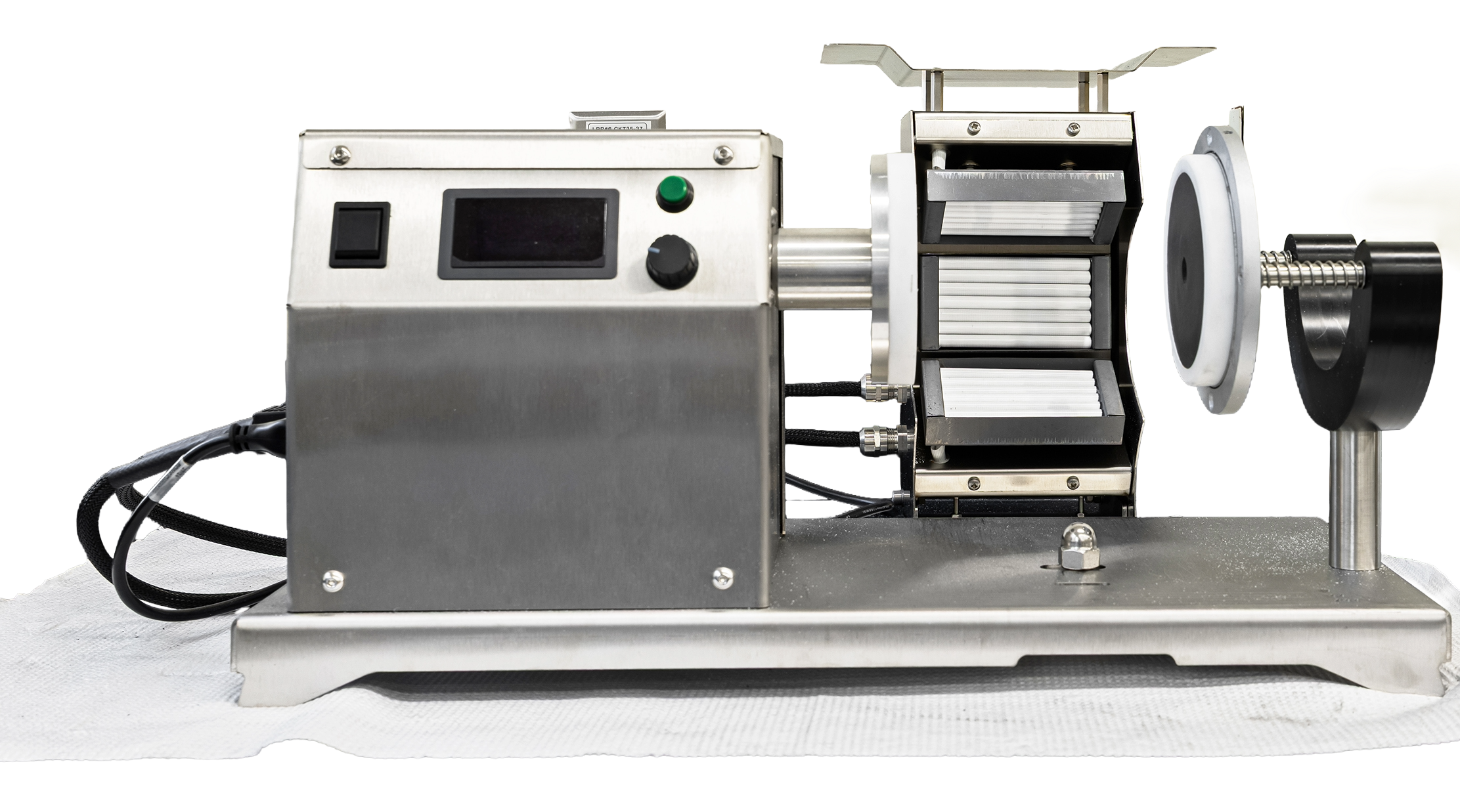 Automatic filter making machine with stainless steel body, digital control panel, and adjustable components for producing filters efficiently. Ideal for small-scale production and laboratory use.